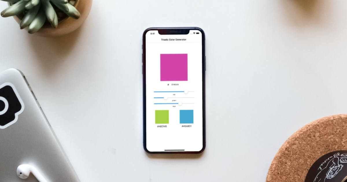 An iPhone with triadic color generator installed